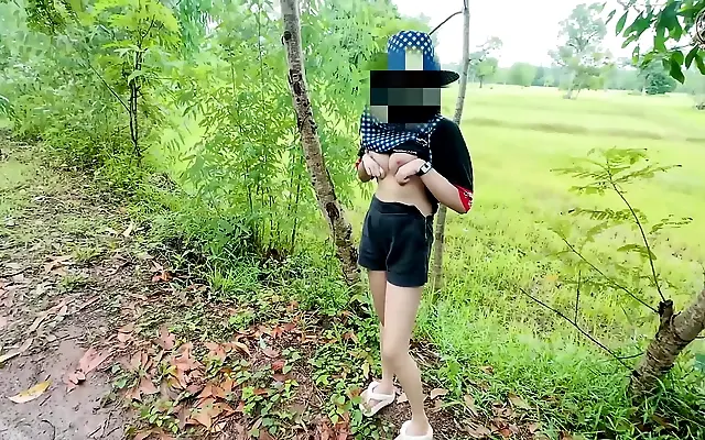 Shows off her pink pussy in public for a horny passerby