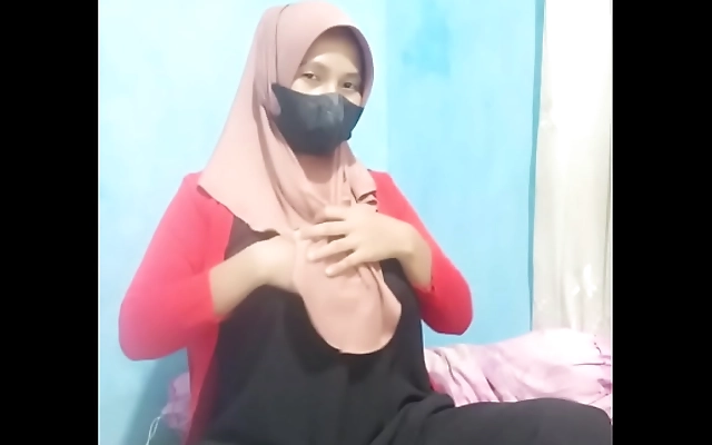 Indonesian Girl in Hijab Masters Her Wet Pussy with a Big Dildo Solo
