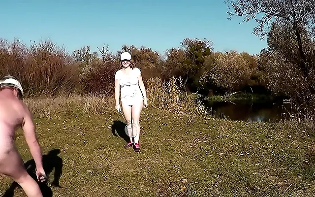 MILF Frina plays badminton naked with her lover on a beach