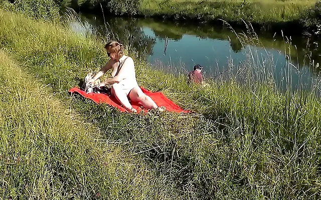 Electric afternoon MILF Frina strips on the riverbank watched by a hungry fisherman