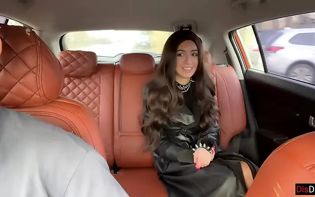 Sunset highway glow through taxi window as hot brunette rides driver for free ride