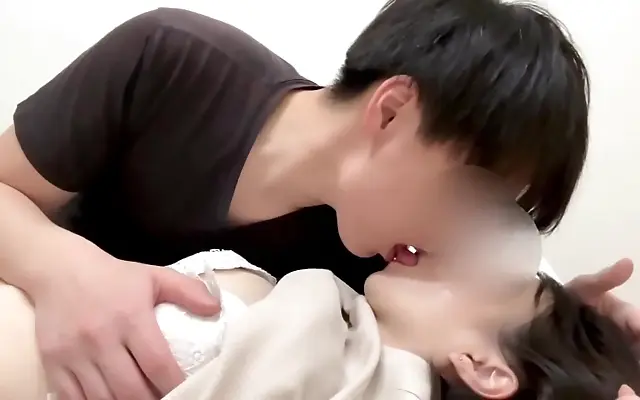 Amateur Japanese beauty deep throats in the bedroom with window light streaming in