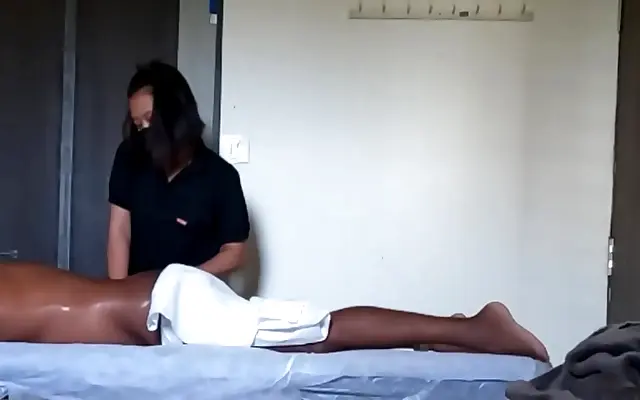 Playful Thai temptress thrilled by surprise black dick massage