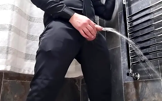 Wet cock erupts on desk with big cum load after long stroke session in elegant black dress