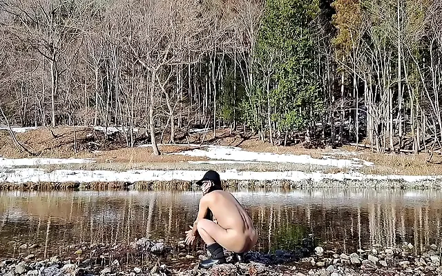 Naked hike through a spring creek with an uncut cock